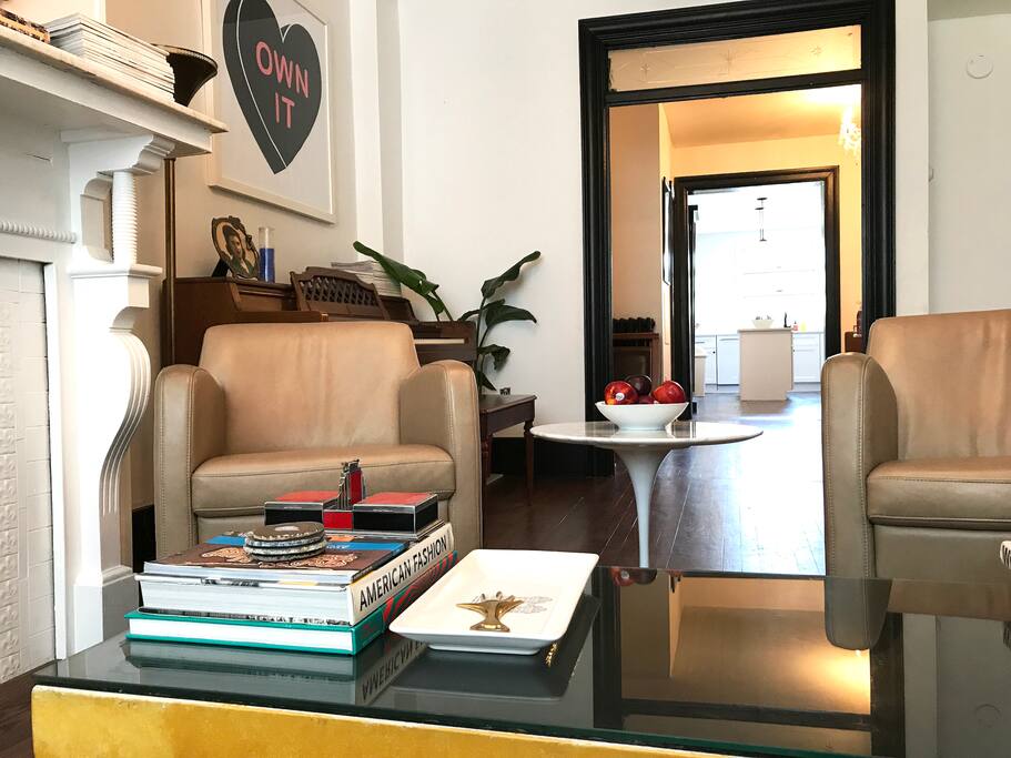 The living room connects to the dining room and kitchen.
