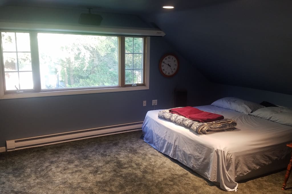 Big picture window to let in the sun and two side windows that crank open to let in fresh air