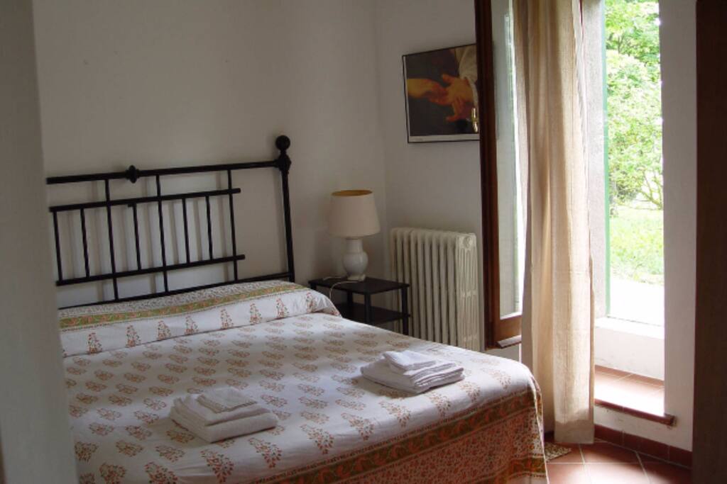One bedroom with door to outside