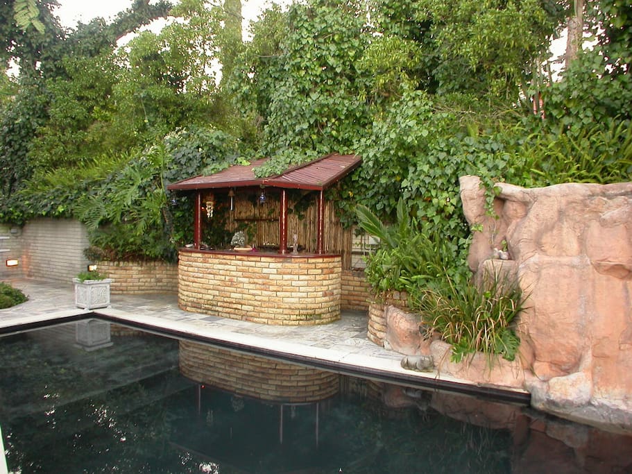 Large outdoor pool and bar area