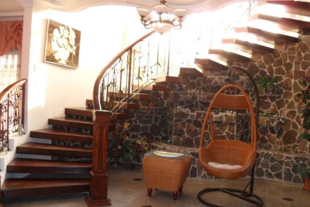 Interior spiral stairs case to second floor