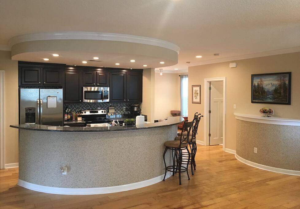 Kitchen and door to guest bath