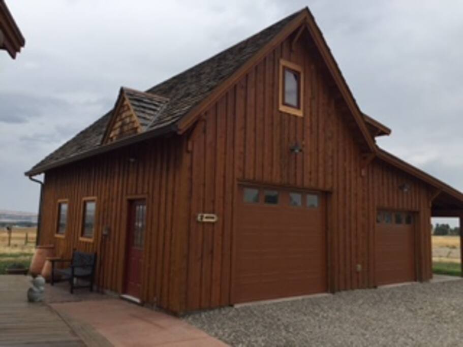 This is the completely detached garage which contains the living space in which you will be staying. It is located in the upper level of the garage.