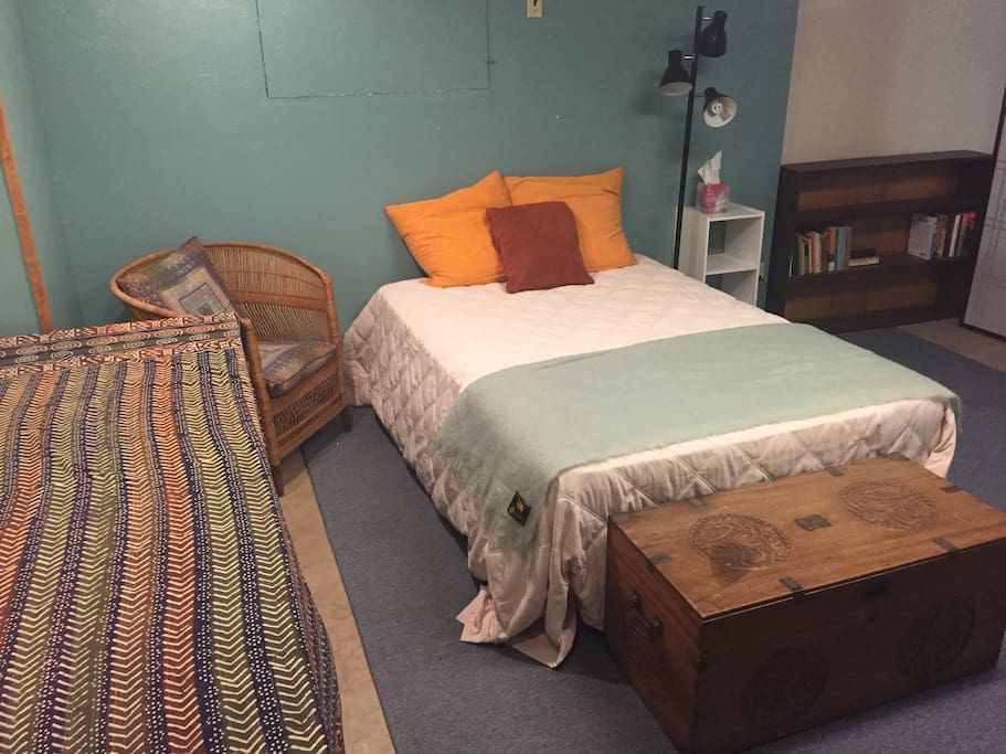 Double bed with down comforter.