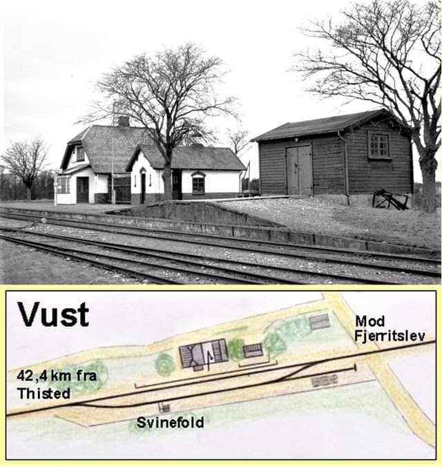 An old, decommissioned railway station is depicted, featuring a main building with a thatched roof and a wooden storage shed. Railroad tracks run in the foreground, and bare trees provide a backdrop. A map below shows the station's location in relation to nearby landmarks.
