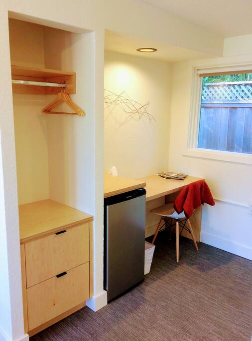 Custom built cabinetry and desk by Smith & Vallee Woodworks, mini-fridge