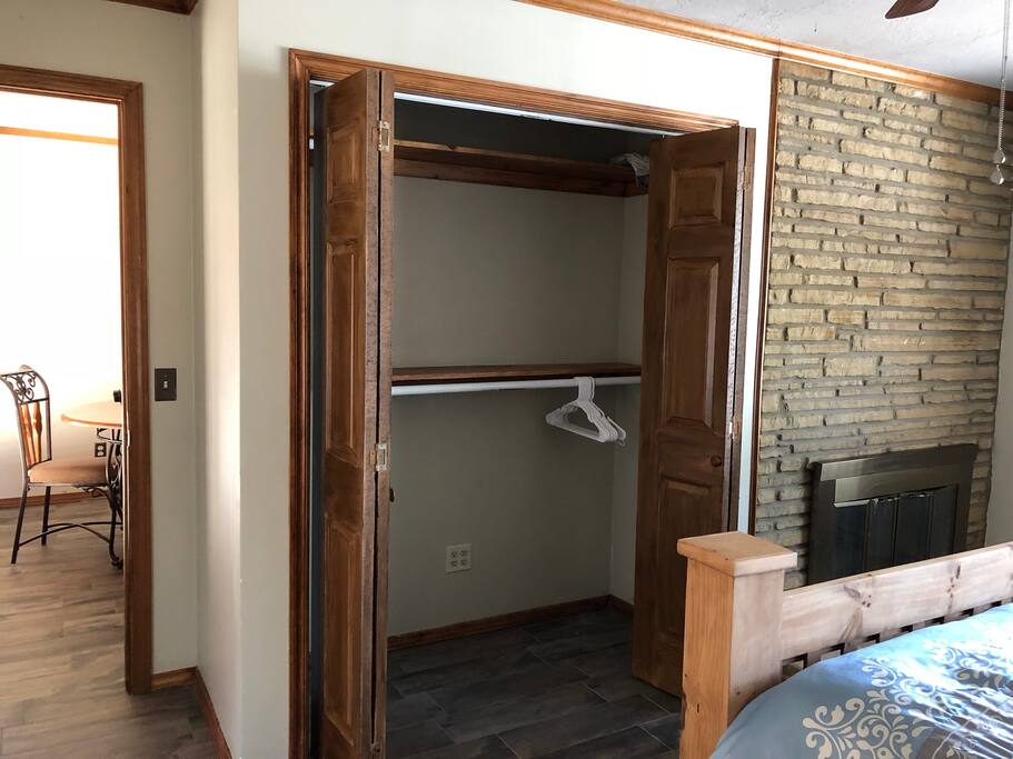Full closet with extra blanket