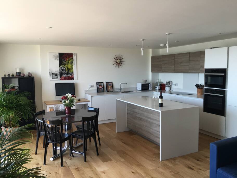 Open living room with kitchen and Island