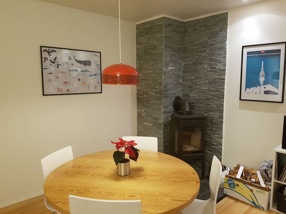 Living room, dining table and fire place