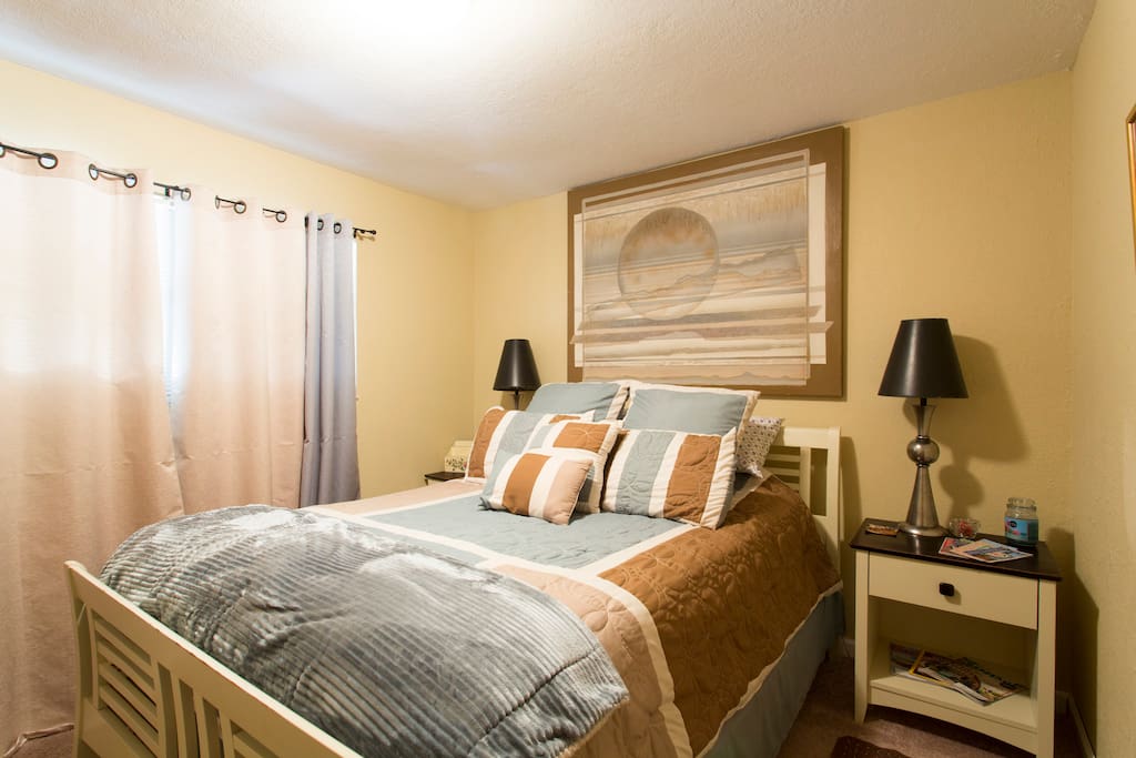 Guest room: : with comfortable bed waiting for you to lay your head.