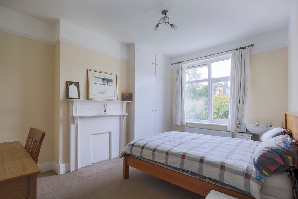 Room with original Edwardian features, overlooks quiet, private garden