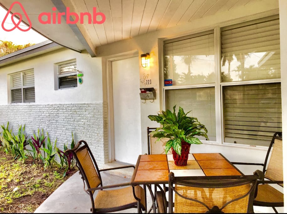Patio Area in front of home, with large table for four