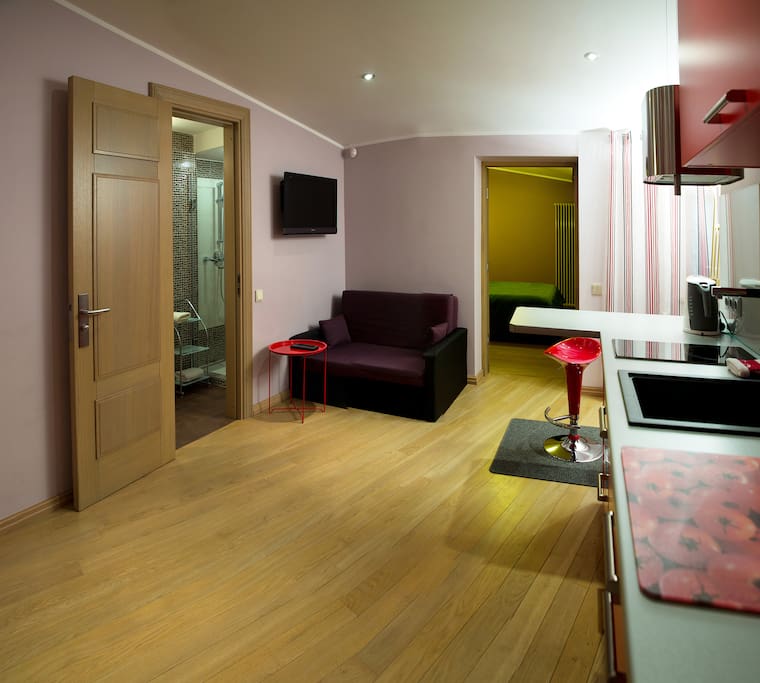 Kitchen with dining area and sofa