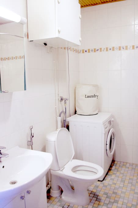 Bathroom and washer.