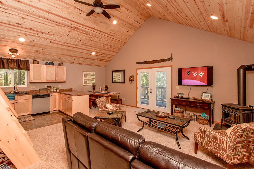 Fantastic great room with a large flatscreen, cable, and dvd. Gas stove for those snowy, winter months.
