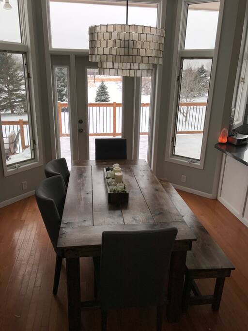 Dining room with lots of seating and beautiful nature light and view