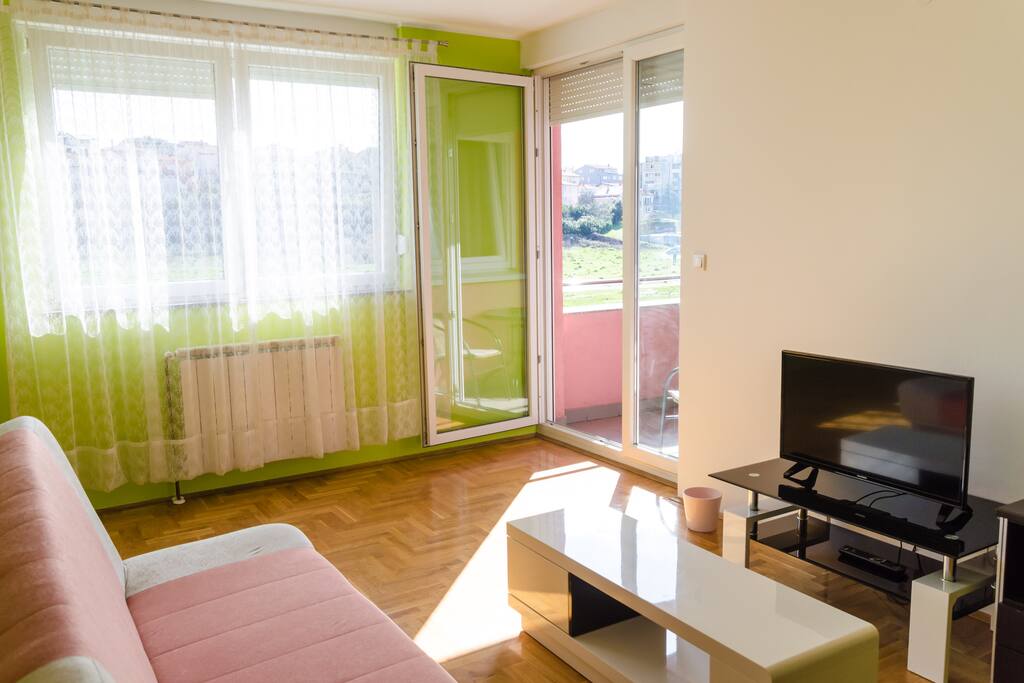 This is a living room that can be modified in a big bedroom. It has a sofa bed for two persons, TV cable, big window, balcony that overlooks at the meadow and it provides access to all rooms in the apartment.