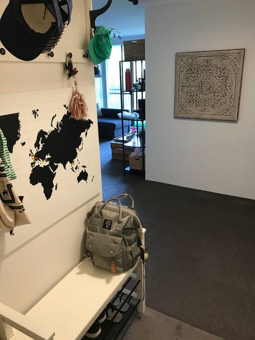 Entrance with a practical hanging coat and shoe rack