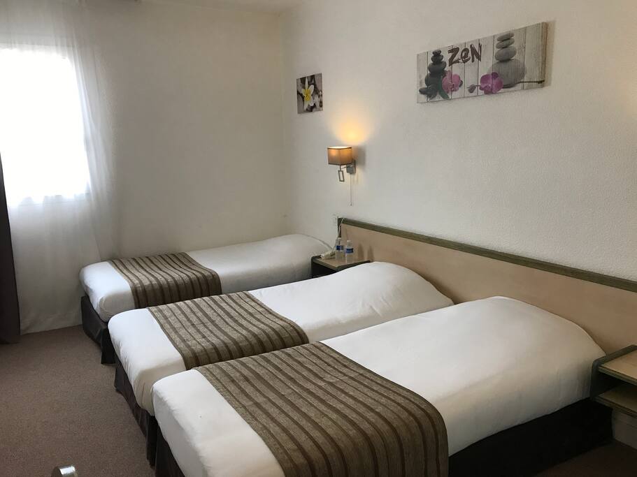 Chambre 3 lits