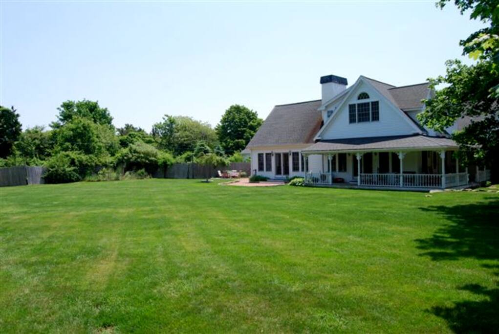 There is a large yard on which to play.