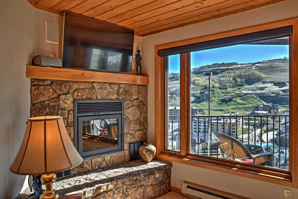 Step inside to find wood paneled ceilings that give the townhome a rustic cabin feel.