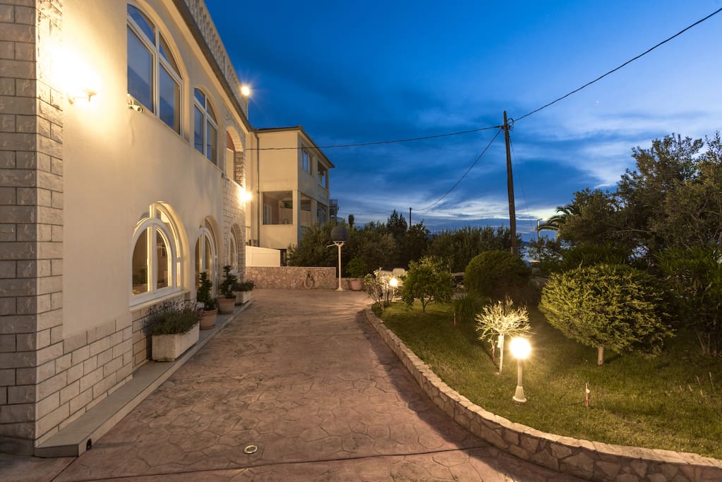 The facade and entrance of the villa