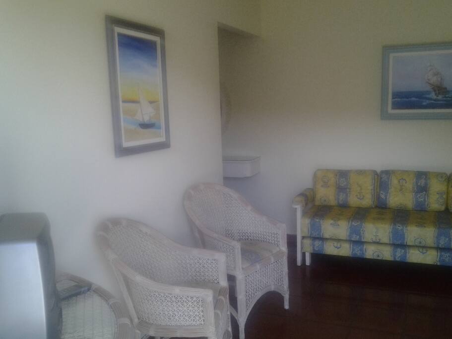 Sala com sofá cama