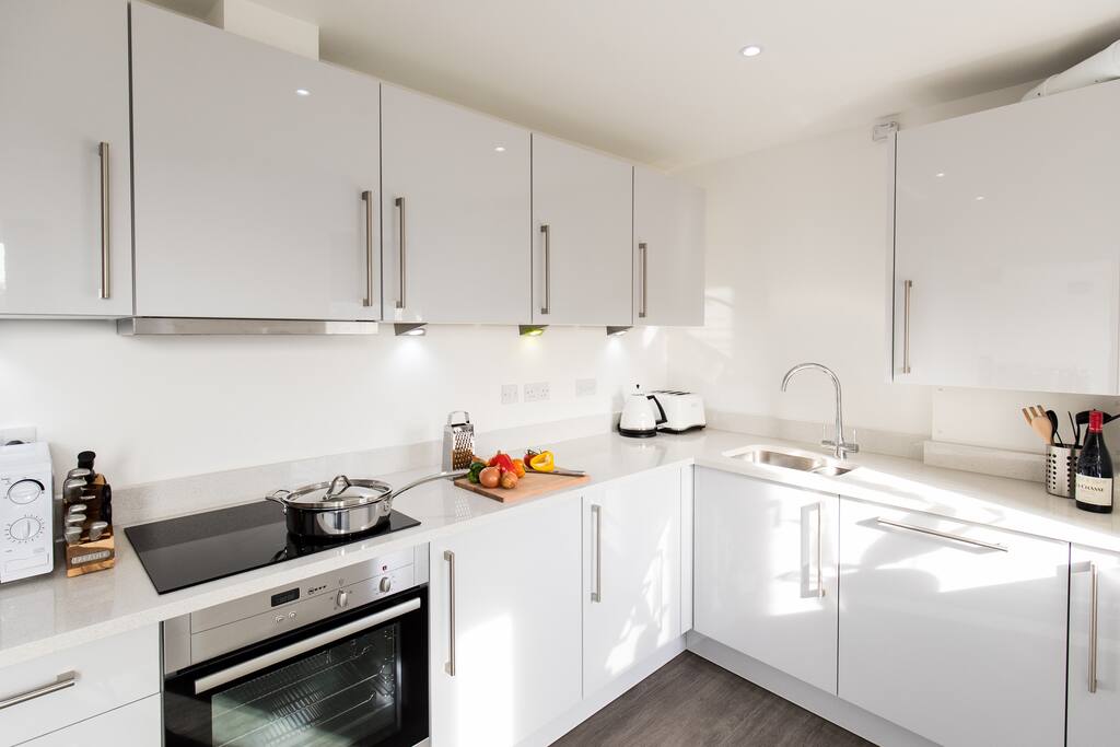 Fully equipped kitchen with integrated appliances