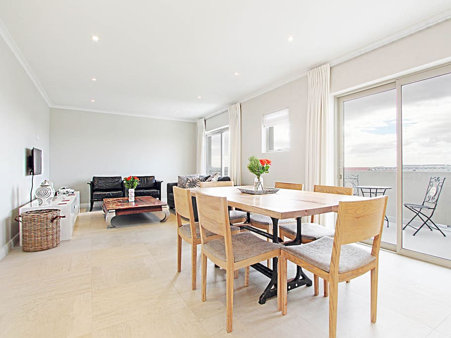 Dining Area and Living Room leading onto balcony