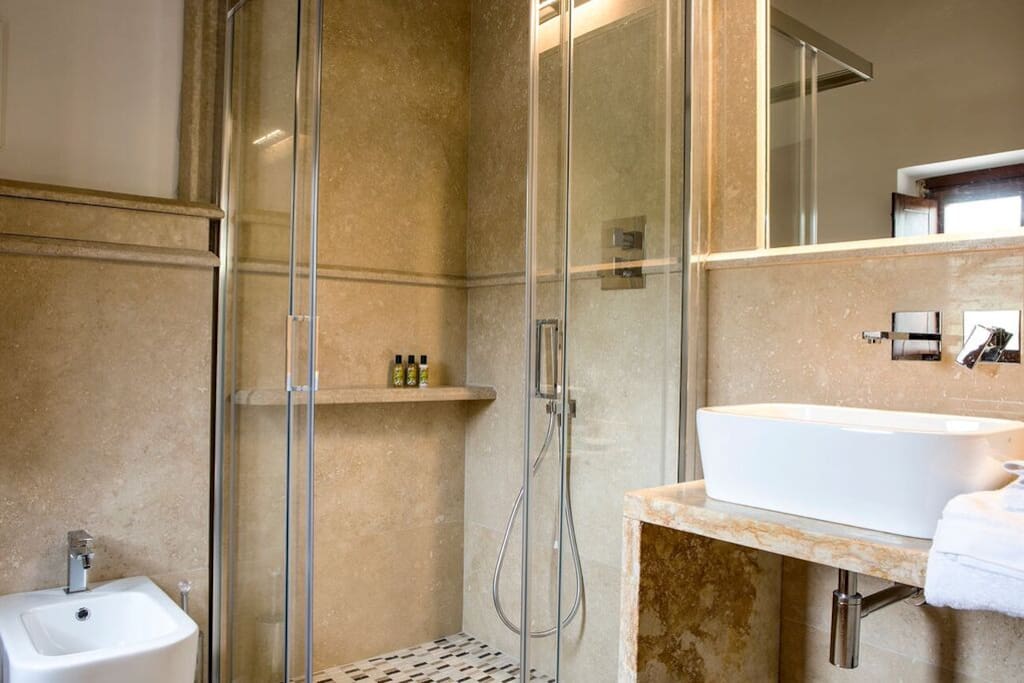 Italian Marble bathrooms give the luxurious feel all with walk in showers and stunning organic olive oil toiletries