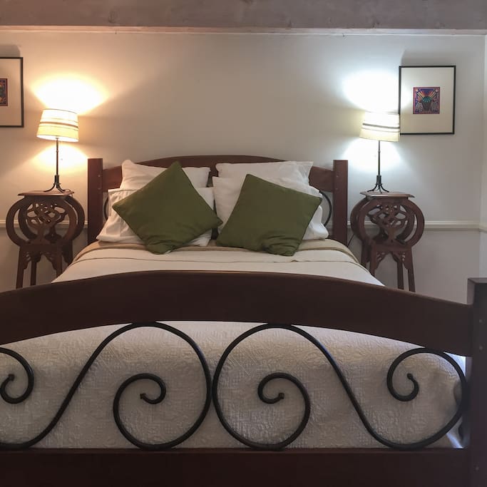 Welcome to your cozy room with a (firm) Queen bed.