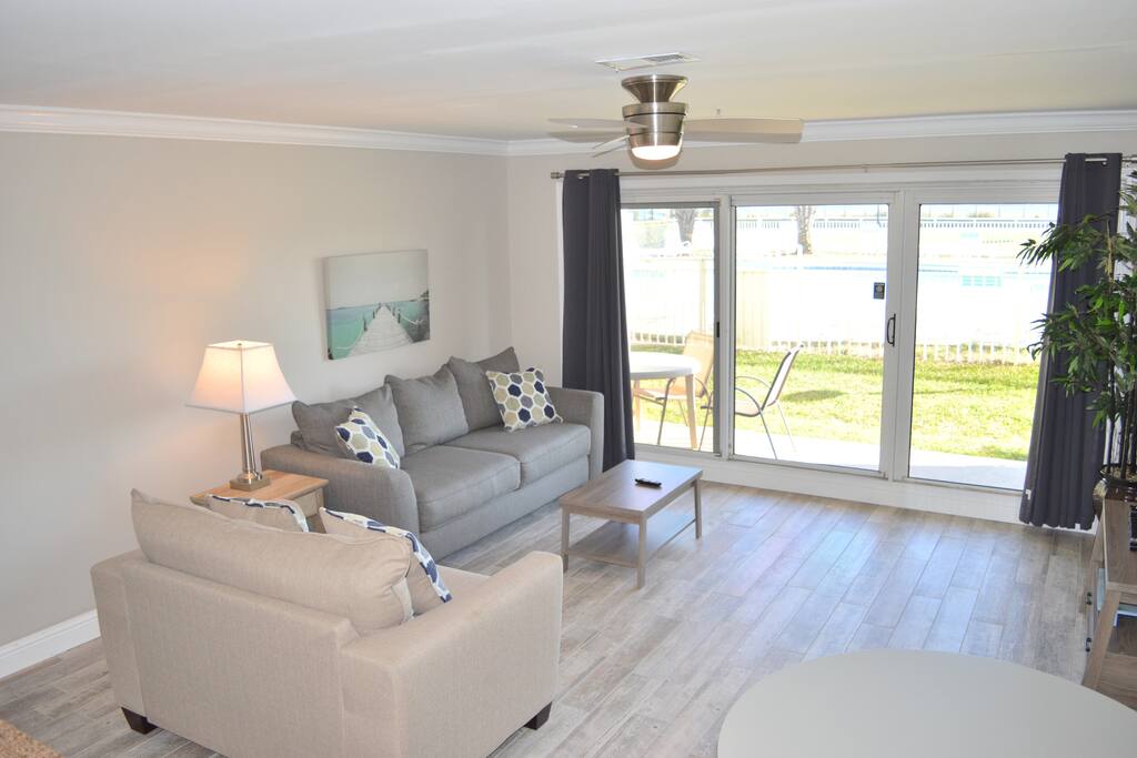 Everything is new in the Living Room! Flooring, Furniture, & Curved TV!