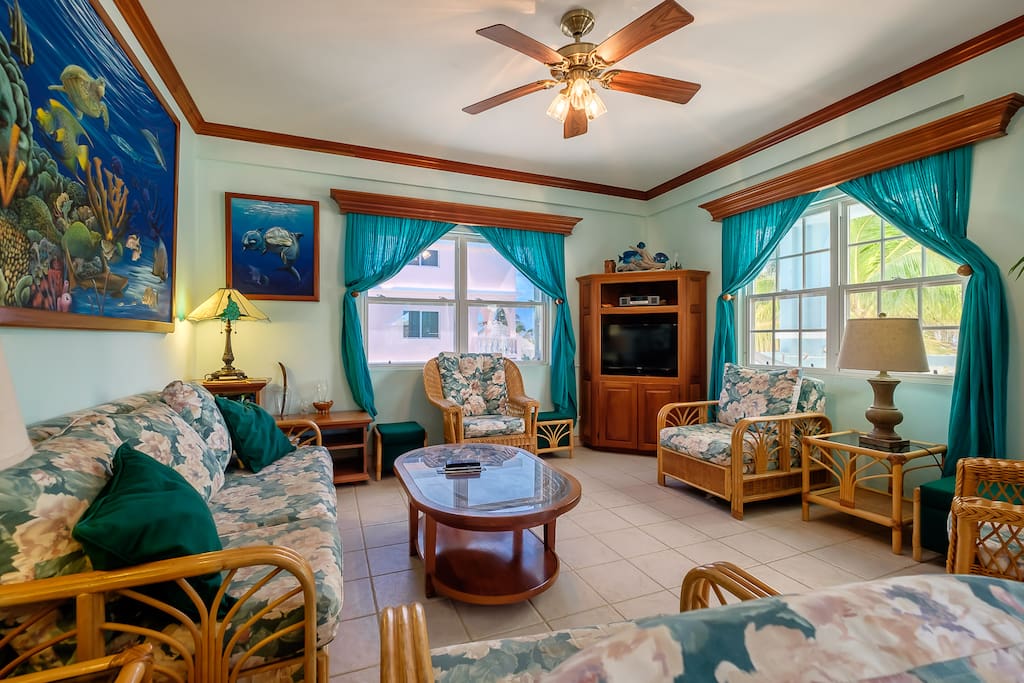 Colorful Living room filled with local artwork
