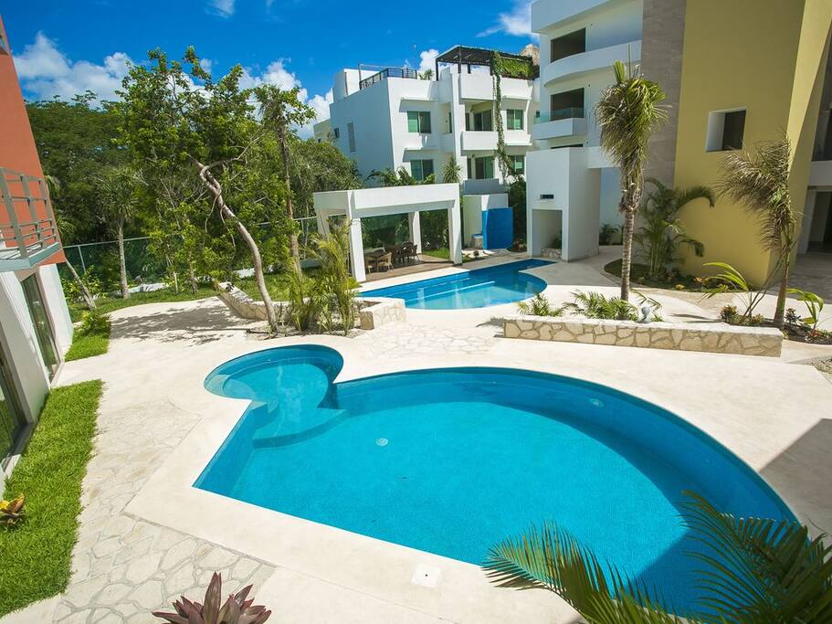 Common area with 2 pools and gazibo