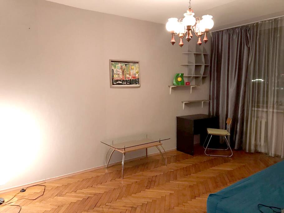 Sofa (sit position) and working table. Комната-студия: диван, рабочее место, wifi