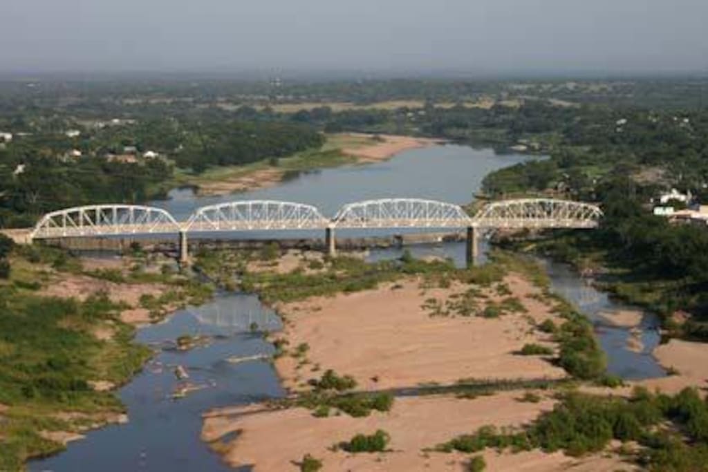 An aerial view of the Llano bridge and river where The Dabbs is located