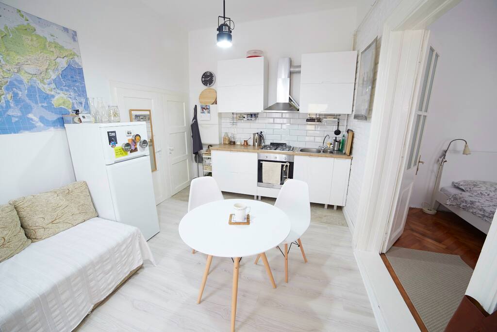 The living room with open kitchen