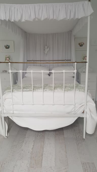 antique four poster bed is so comfortable