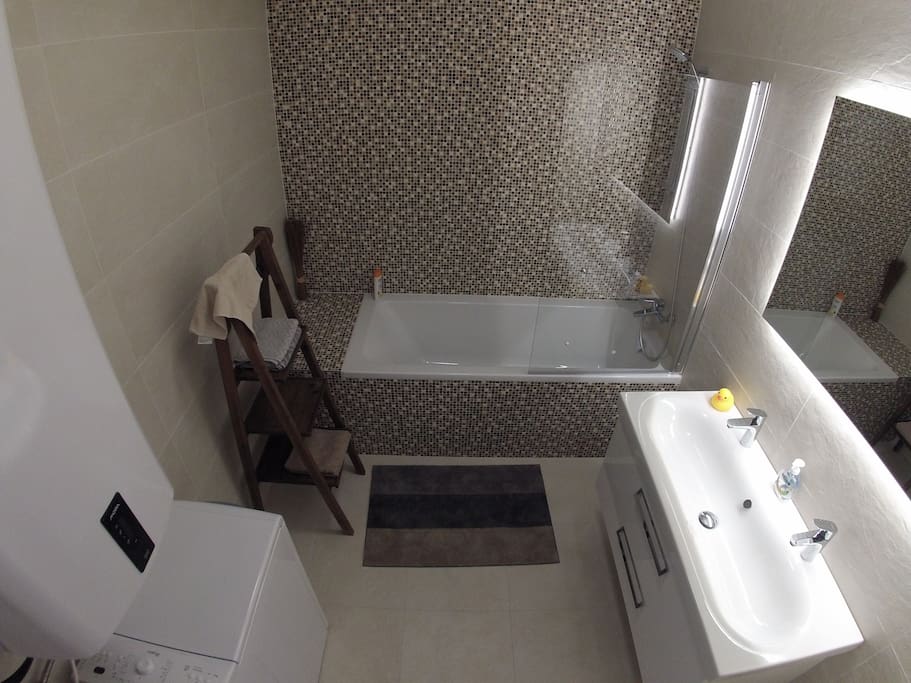 Luxury bathroom with separate WC. Washing machine and own water heating
