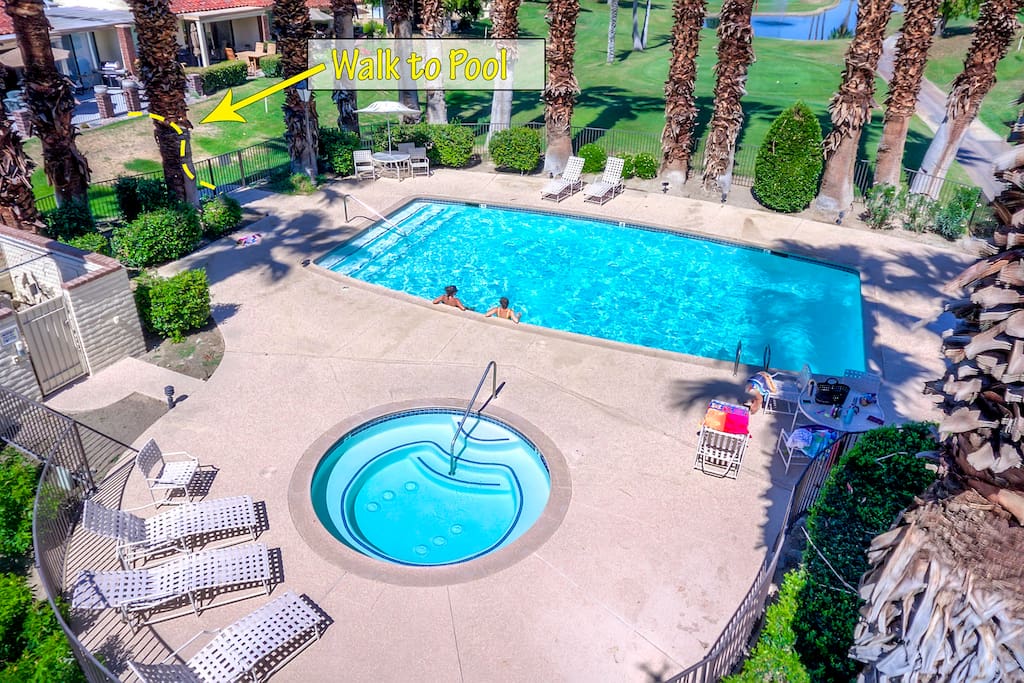 Aerial photo of South facing back patio with extended gated deck. Resort beach towels furnished
