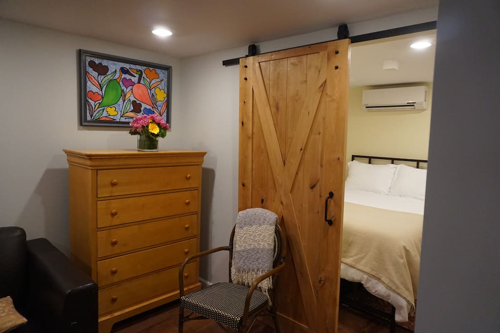 A drawer system for long stay guest to use along with a walk-in closet with accessories.