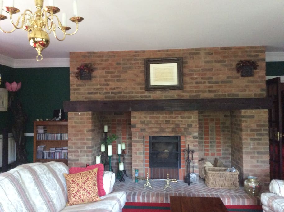 Large drawing room with open fireplace