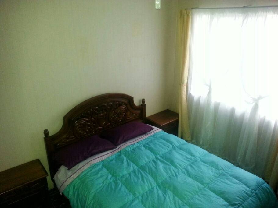 Pieza con cama matrimonial