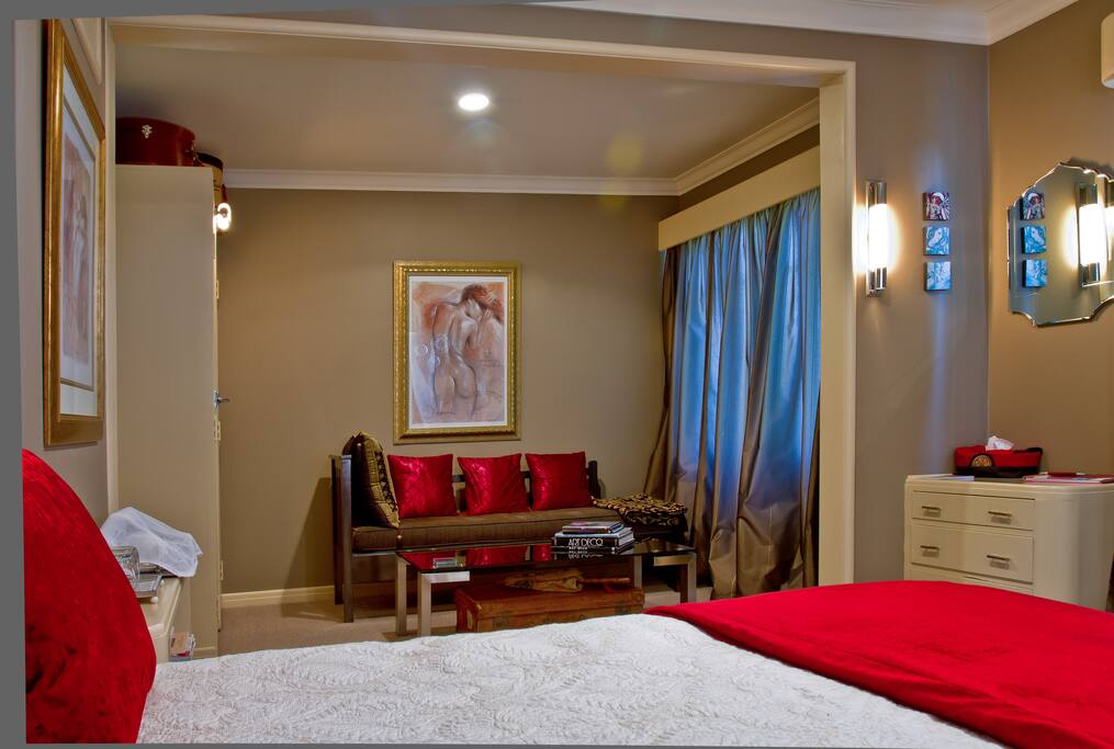 Beautifully appointed spacious guest room in Art Deco style
