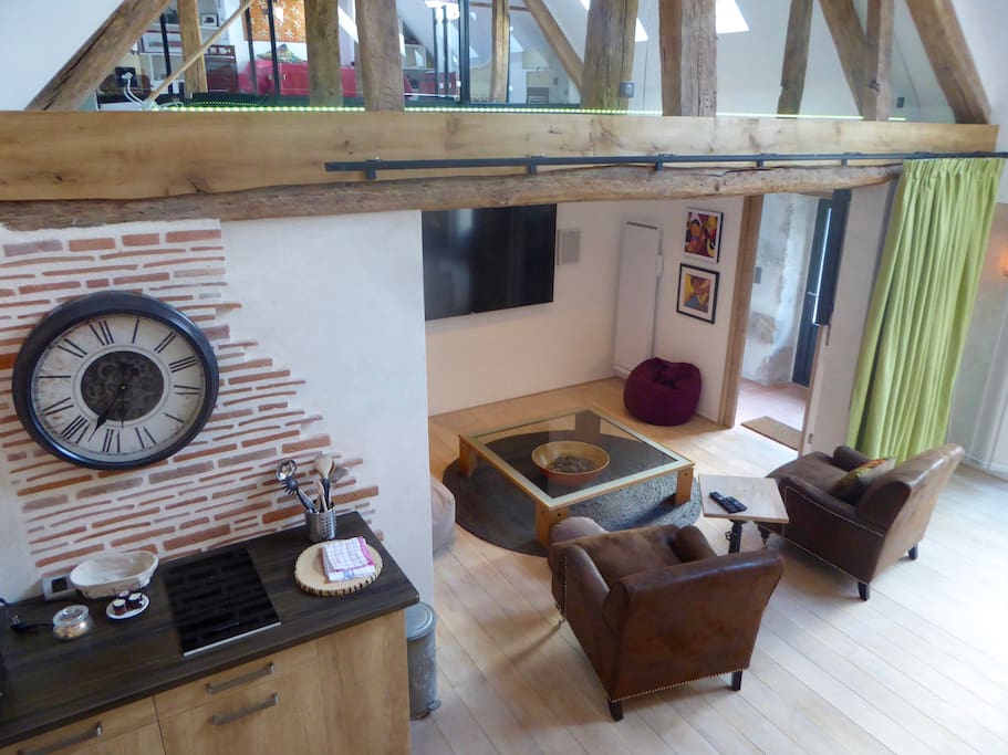 Living Room en suite with the Tv room and the fire place area, ground floor