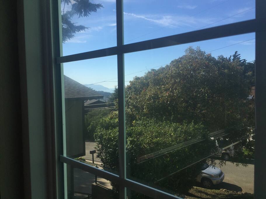 View from bedroom window; peek-a-boo Ocean shot.