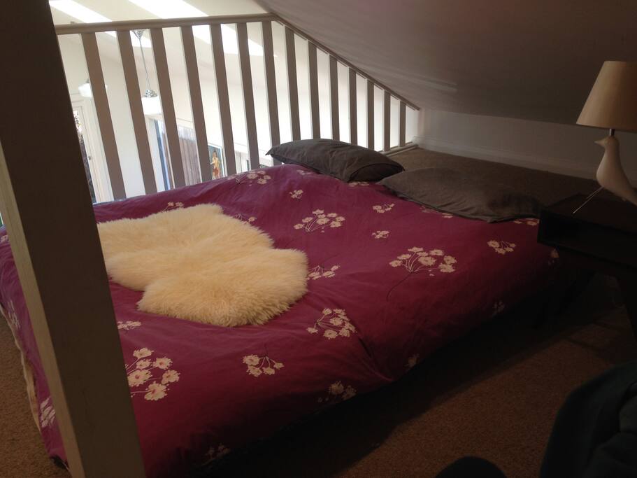 Half the loft space (pictured with two single mattresses stuck together)