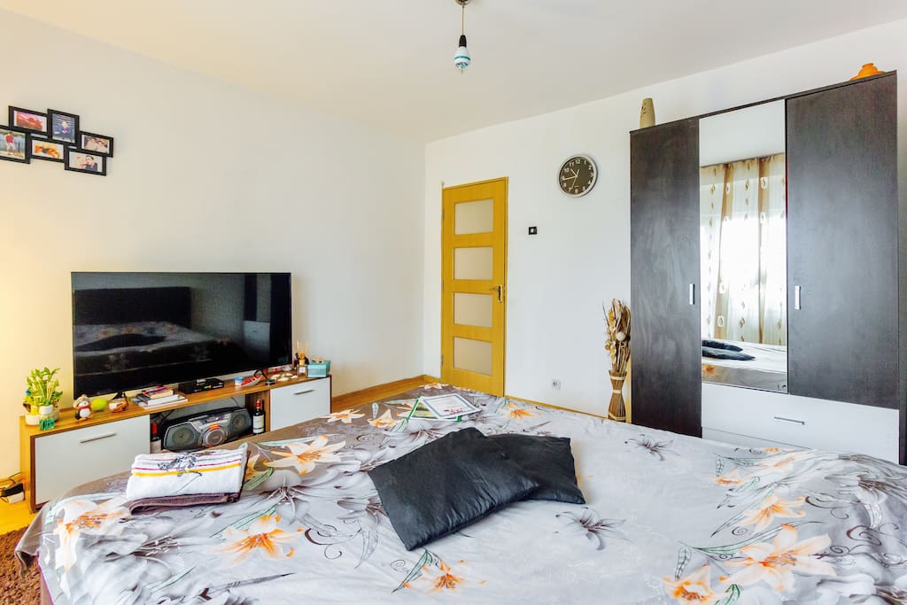 Spacious room with modern furniture and decorations