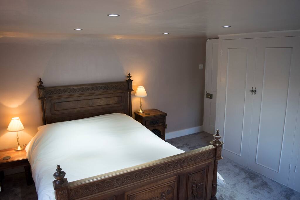 Fitted wardrobes with plenty of space for hanging clothes/storing clothes