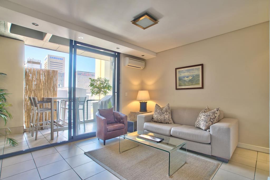 North facing lounge with outdoor flow to a verandah.
